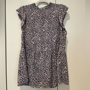 Angashion sleeveless animal print peplum blouse.